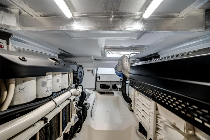 Godspeed Yacht Photos Pics Engine room of 2024 Maritimo M55 yacht, showcasing advanced machinery and equipment.