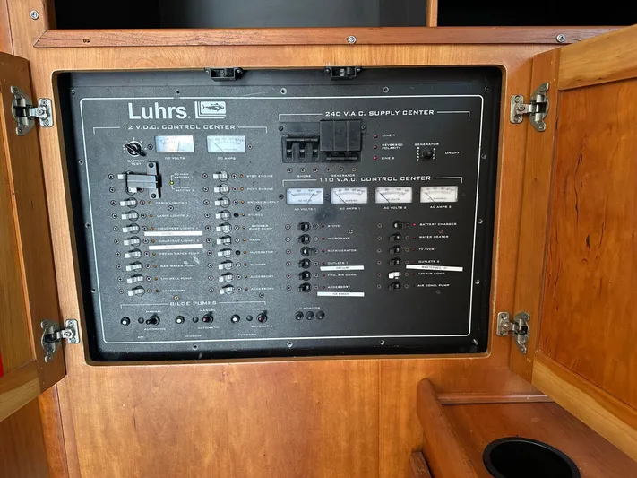  Yacht Photos Pics Control panel of 2003 Luhrs 40 Convertible boat, featuring electrical switches and indicators.