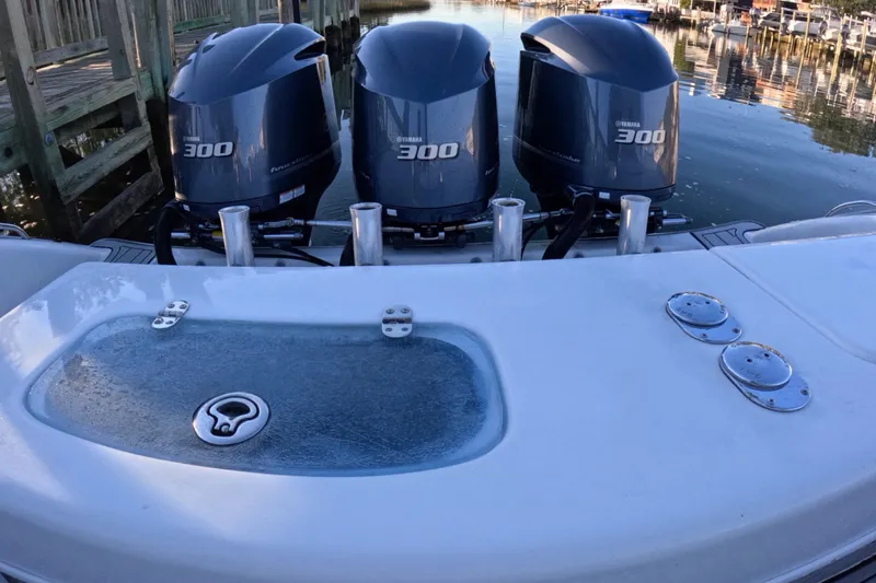  Yacht Photos Pics 2007 Cape Horn 36T boat with triple Yamaha 300 engines docked by the water.