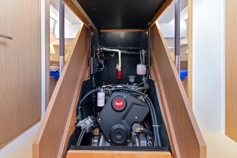 Heartbeat Yacht Photos Pics Engine compartment of 2024 Beneteau Oceanis Yacht 54, showcasing modern marine engineering.