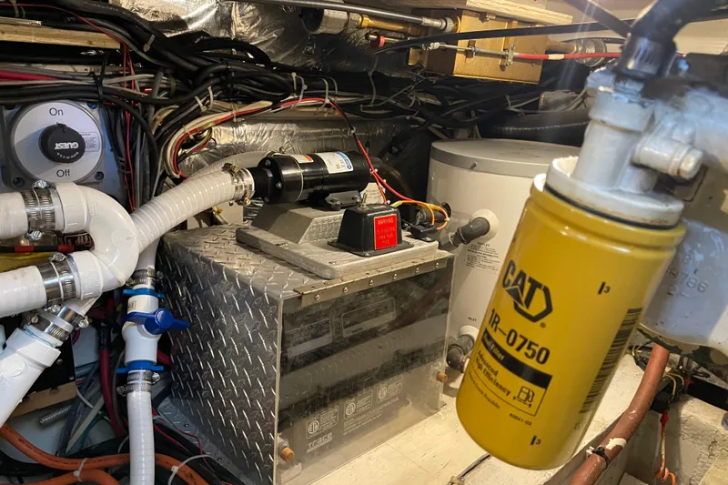  Yacht Photos Pics Engine room of 1988 Chris-Craft 392 Sport Fish with CAT filter and wiring.