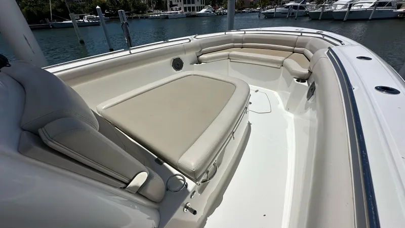  Yacht Photos Pics 2017 Boston Whaler 330 Outrage boat with spacious seating and elegant design.