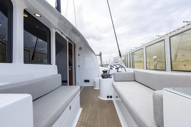 Katari Yacht Photos Pics Spacious deck of 2018 Tag 60 yacht with comfortable seating and modern design.