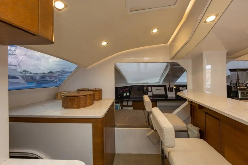Katari Yacht Photos Pics Luxurious interior of 2018 Tag 60 yacht with modern helm and seating area.