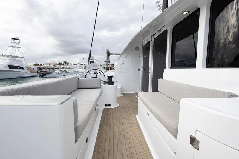 Katari Yacht Photos Pics Spacious deck of 2018 Tag 60 yacht with comfortable seating and modern design.