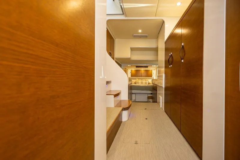 Katari Yacht Photos Pics Luxurious interior of 2018 Tag 60 yacht with wooden finishes and cozy bedroom.