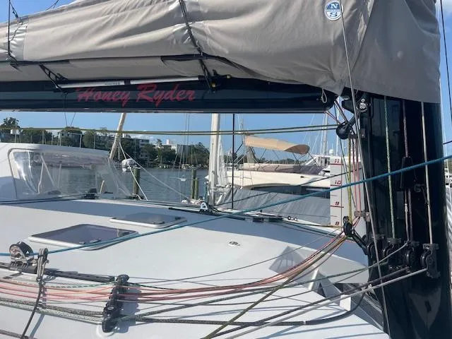Honey Ryder Yacht Photos Pics 2022 HH Catamarans 50 sailboat docked, featuring rigging and deck details.