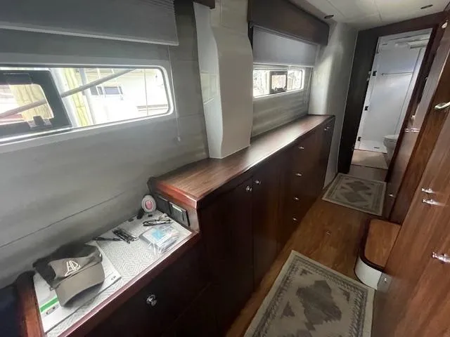 Honey Ryder Yacht Photos Pics Interior of 2022 HH Catamarans 50, featuring wood cabinetry and modern design elements.