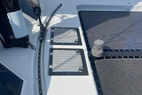 Honey Ryder Yacht Photos Pics Deck of 2022 HH Catamarans 50 with netting and hatches.