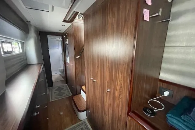 Honey Ryder Yacht Photos Pics Interior of 2022 HH Catamarans 50, featuring wood paneling and modern design elements.