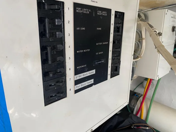  Yacht Photos Pics Electrical panel on a 1998 Hatteras 39 Sport Express boat.