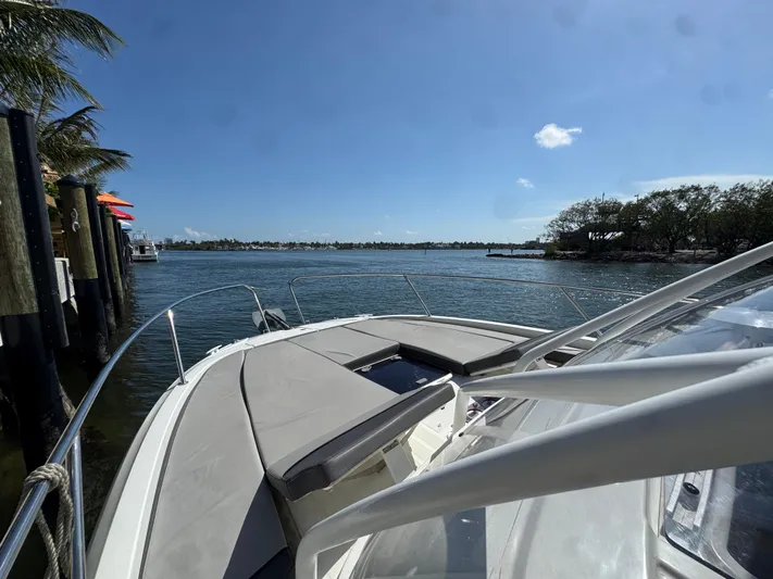  Yacht Photos Pics 2020 Jeanneau Leader 9.0 WA boat on calm water under clear blue sky.