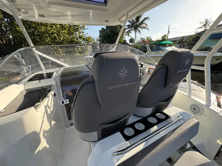  Yacht Photos Pics 2020 Jeanneau Leader 9.0 WA boat interior with helm seats and dashboard.