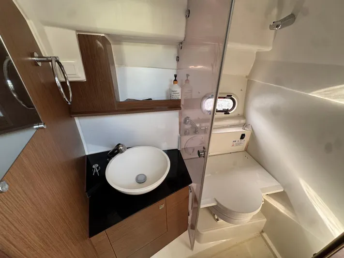  Yacht Photos Pics 2020 Jeanneau Leader 9.0 WA bathroom with modern sink and toilet.