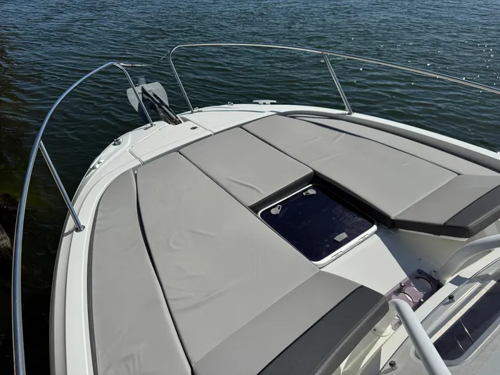  Yacht Photos Pics 2020 Jeanneau Leader 9.0 WA boat with spacious sunbathing deck on calm water.