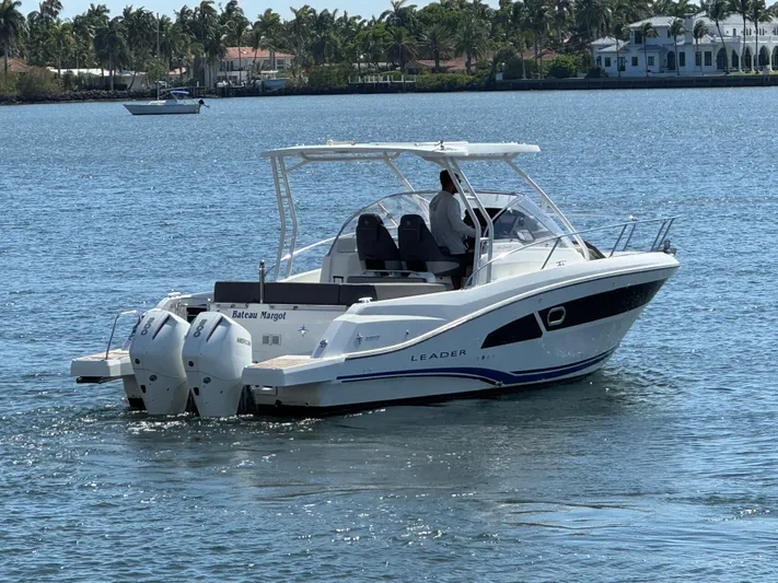  Yacht Photos Pics 2020 Jeanneau Leader 9.0 WA boat cruising on a sunny day in a scenic waterway.