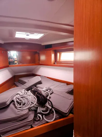 Far Star Yacht Photos Pics Interior of 2012 Beneteau Oceanis 41 sailboat with ropes and cushions.