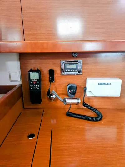 Far Star Yacht Photos Pics Control panel of a 2012 Beneteau Oceanis 41 sailboat with communication equipment.