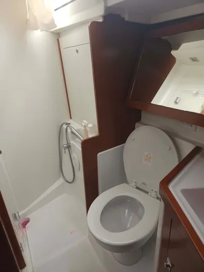 Far Star Yacht Photos Pics 2012 Beneteau Oceanis 41 yacht bathroom with shower and toilet.