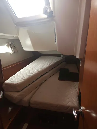 Far Star Yacht Photos Pics Interior cabin of 2012 Beneteau Oceanis 41 sailboat with twin beds.