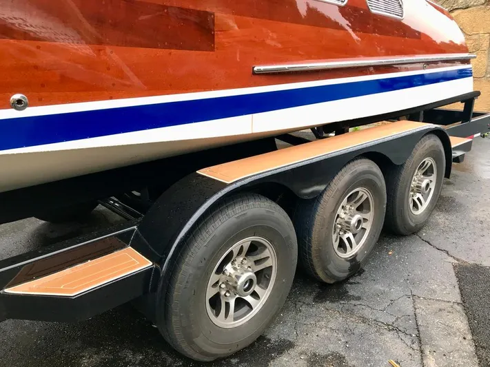  Yacht Photos Pics Custom 2020 Windlea Runabout boat on a triple-axle trailer, showcasing sleek design.