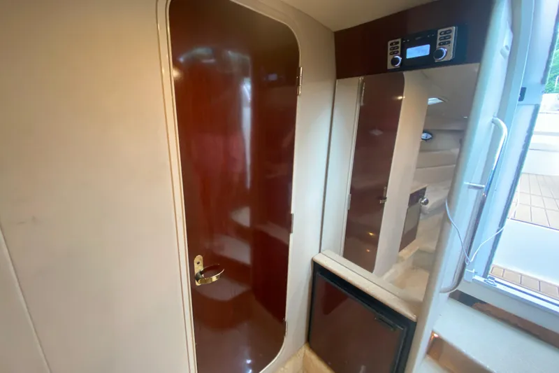  Yacht Photos Pics Interior of 2004 Formula 370ss boat with wooden doors and modern amenities.