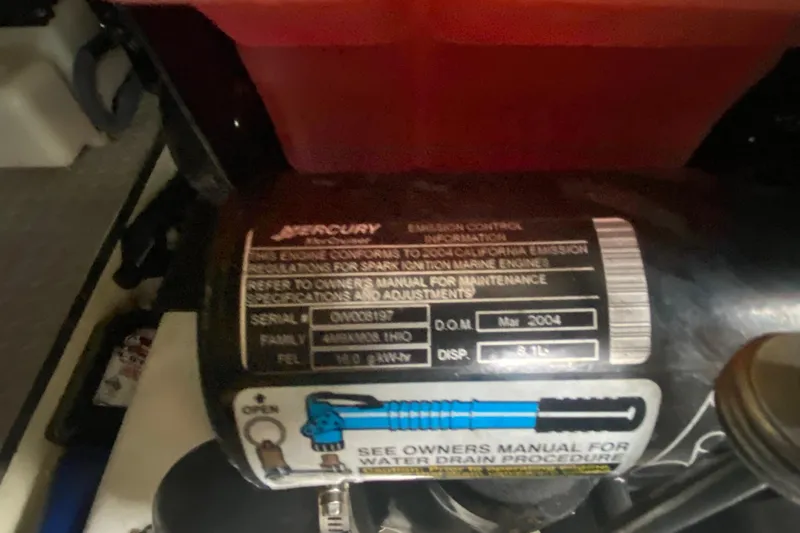  Yacht Photos Pics Mercury engine label on 2004 Formula 370ss, showing emission control information.