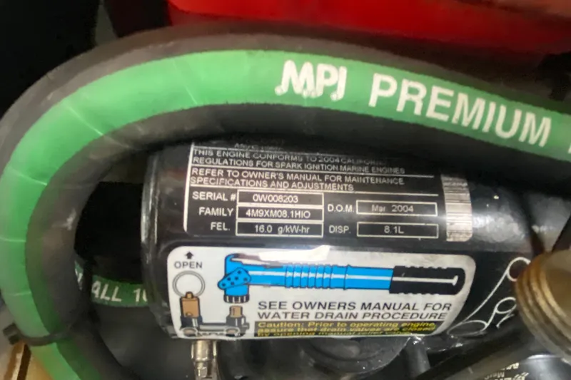  Yacht Photos Pics Engine label of a 2004 Formula 370ss, showing specifications and maintenance instructions.