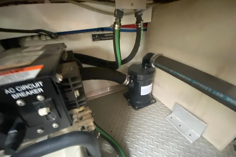  Yacht Photos Pics Engine compartment of a 2004 Formula 370ss boat with AC circuit breaker and hoses.