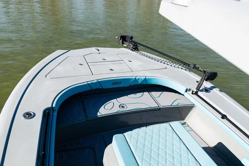  Yacht Photos Pics 2022 Costa Custom Boats 264, sleek deck design on calm water.