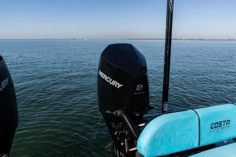  Yacht Photos Pics 2022 Costa Custom Boats 264 with Mercury engine on calm water.