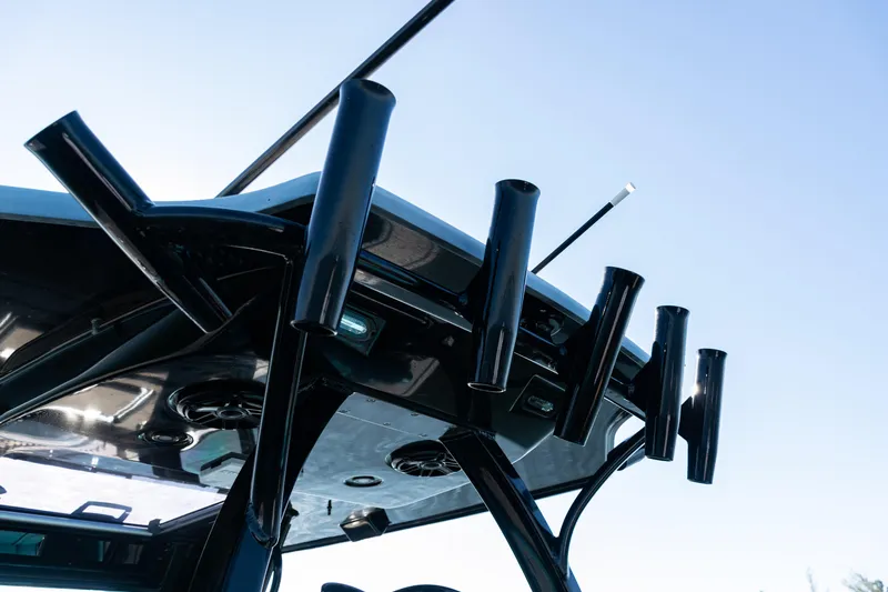  Yacht Photos Pics Rooftop rod holders on 2022 Costa Custom Boats 264 against clear sky.