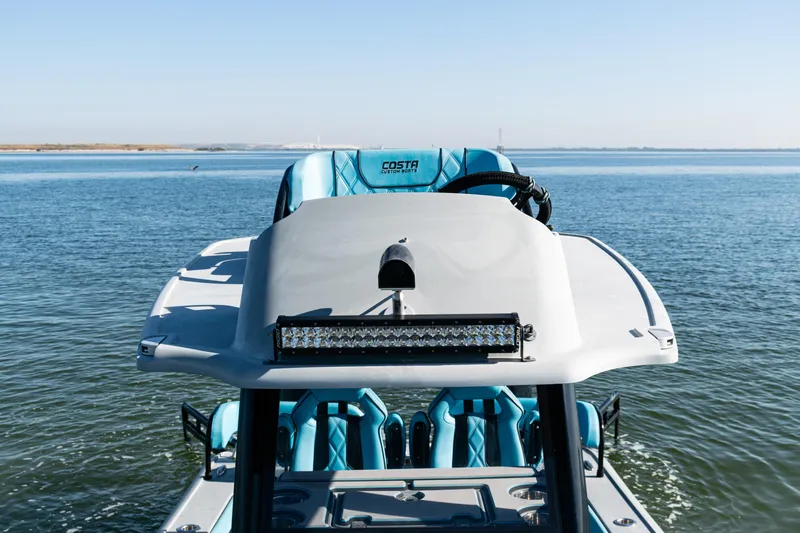  Yacht Photos Pics 2022 Costa Custom Boats 264 on water, featuring sleek design and modern seating.