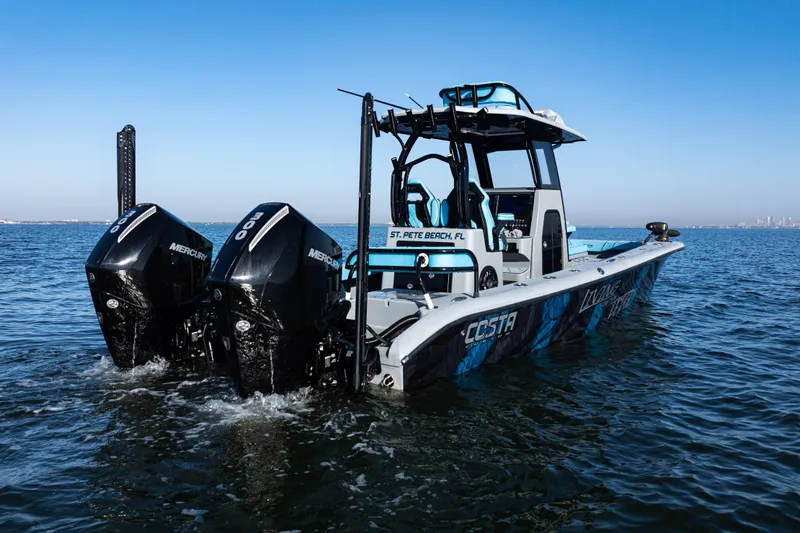  Yacht Photos Pics 2022 Costa Custom Boats 264 on water, featuring dual Mercury engines.