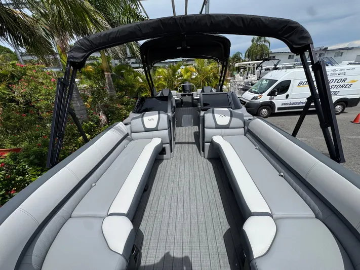  Yacht Photos Pics 2025 Avalon Catalina Platinum Quad Lounge boat with spacious seating and sleek design.