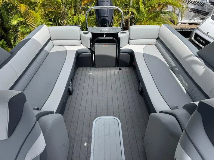  Yacht Photos Pics 2025 Avalon Catalina Platinum Quad Lounge boat interior with gray seating and sleek design.