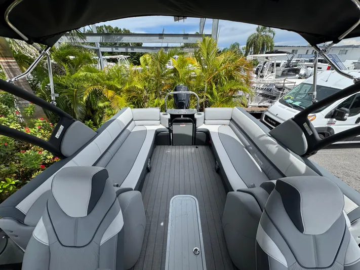  Yacht Photos Pics 2025 Avalon Catalina Platinum Quad Lounge boat interior with gray seating and modern design.