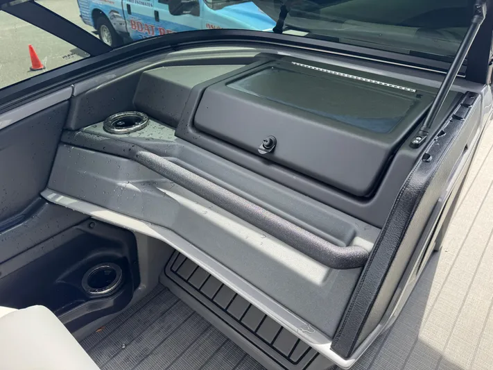  Yacht Photos Pics Interior of 2025 Avalon Catalina Platinum Quad Lounge boat, featuring sleek seating and cup holders.