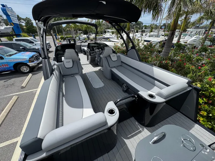  Yacht Photos Pics 2025 Avalon Catalina Platinum Quad Lounge boat with sleek seating and modern design.