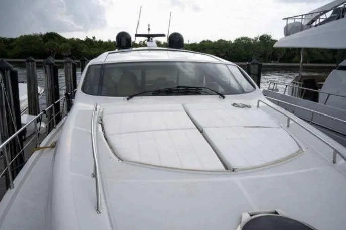 Chopin Yacht Photos Pics 2007 Pershing 62' yacht docked, sleek design, white exterior, luxury vessel.