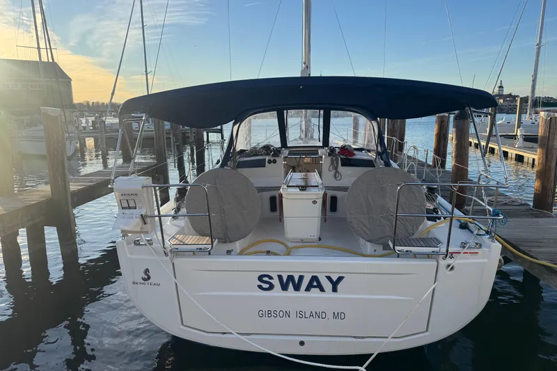 Sway Yacht Photos Pics 2023 Beneteau Oceanis 40.1 sailboat docked at marina, rear view.