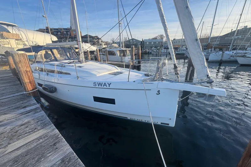 Sway Yacht Photos Pics 2023 Beneteau Oceanis 40.1 sailboat docked at a marina, sunny day.