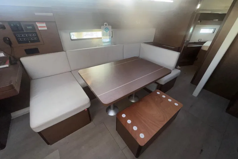 Sway Yacht Photos Pics Interior of 2023 Beneteau Oceanis 40.1 yacht with modern dining area and seating.
