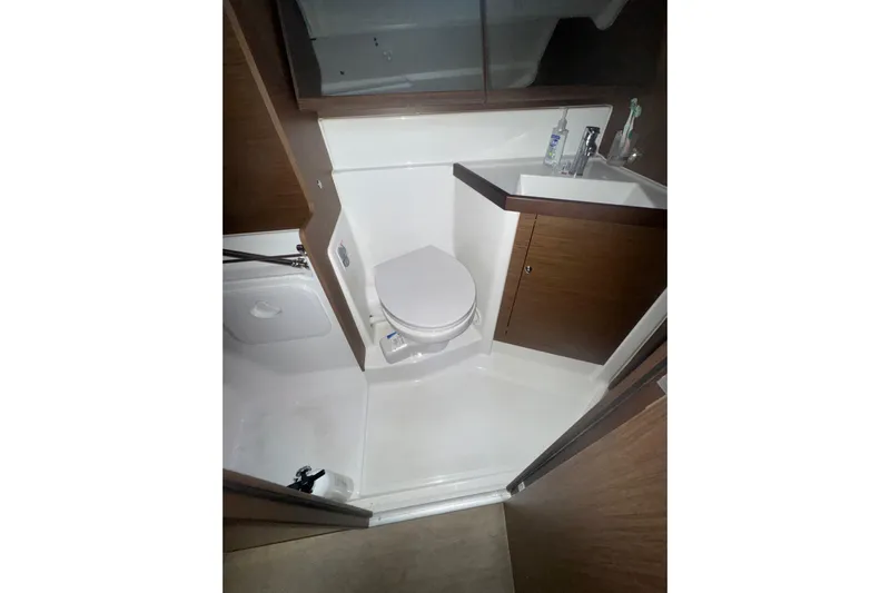 Sway Yacht Photos Pics Bathroom interior of 2023 Beneteau Oceanis 40.1 yacht, featuring modern fixtures and wood accents.