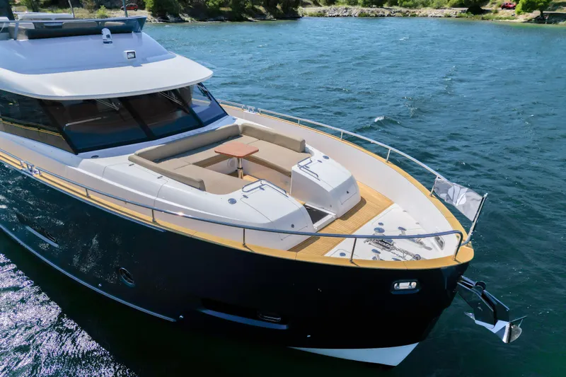 Izi Yacht Photos Pics Azimut Magellano 66 yacht cruising on water, 2017 model, elegant design.