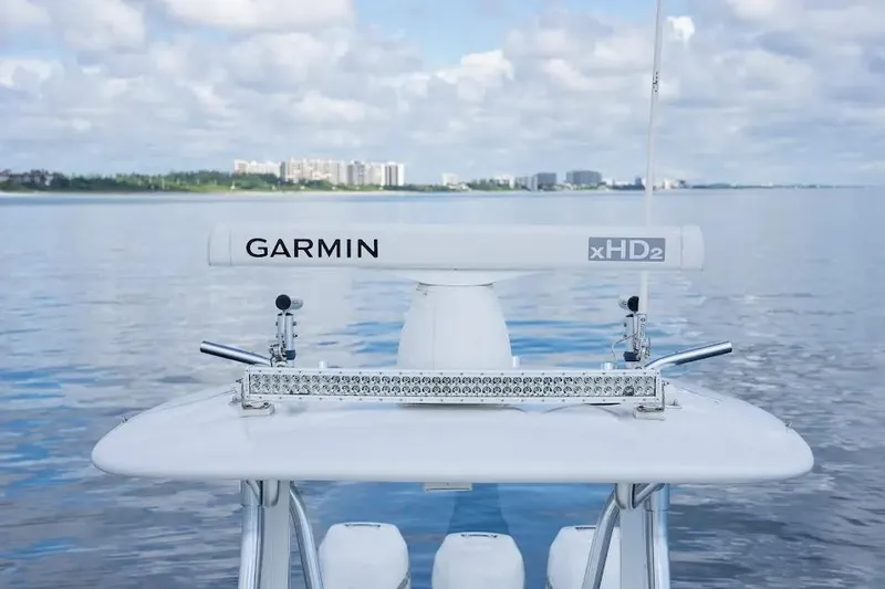  Yacht Photos Pics 2013 Contender 35 ST boat with Garmin xHD2 radar on calm water.