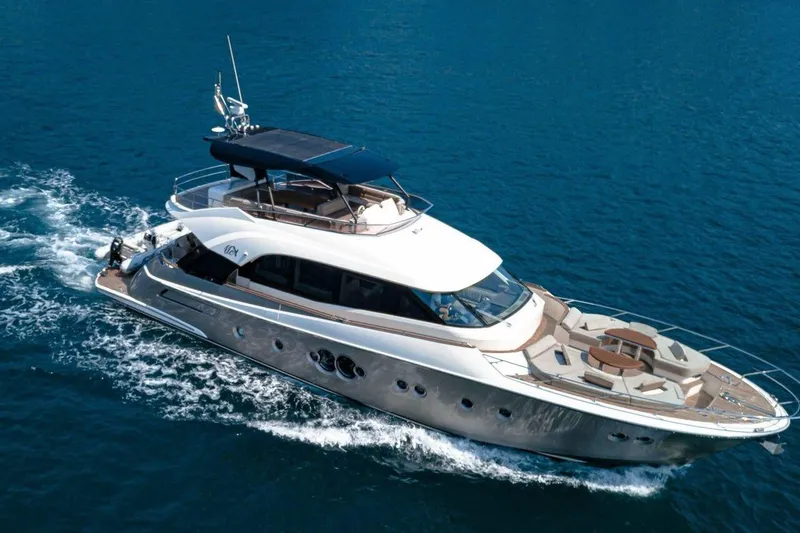 Wasana Yacht Photos Pics 2015 Monte Carlo Yachts MCY 70 cruising on open blue waters.