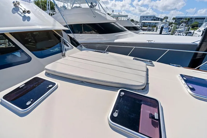 Tutto Bene Yacht Photos Pics 2018 Palm Beach Motor Yachts PB55 Flybridge, docked with sunroof and hatches visible.