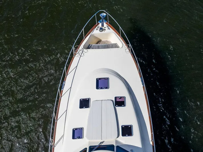 Tutto Bene Yacht Photos Pics 2018 Palm Beach Motor Yachts PB55 Flybridge, aerial view of bow on water.
