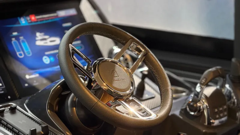  Yacht Photos Pics Steering wheel and dashboard of 2022 Absolute 60 Fly yacht.